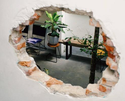 Hole in the wall caused by tenant damage.